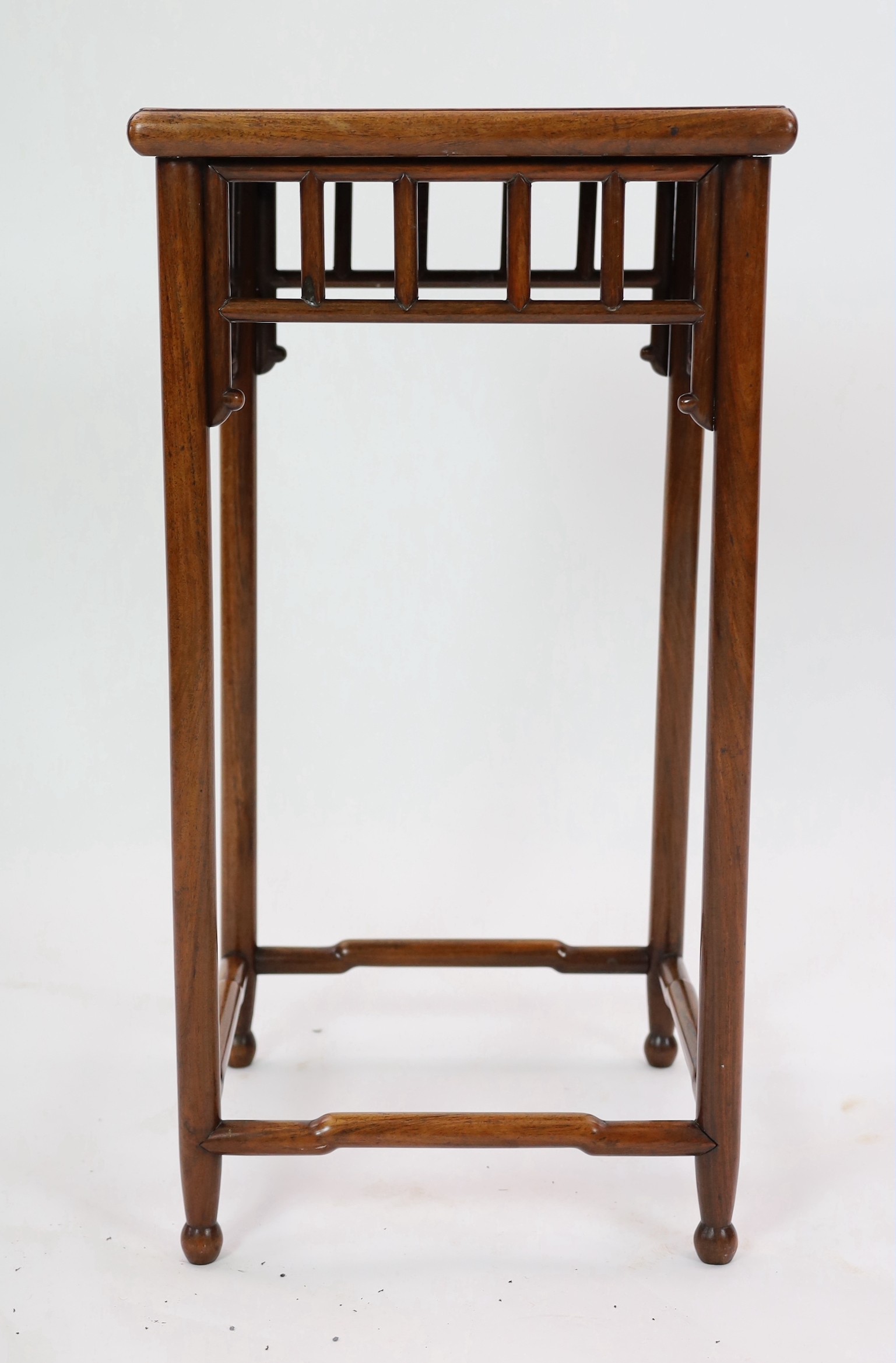 A Chinese huanghuali or hongmu incense stand, Qing dynasty, 77.5cm high, 41cm wide